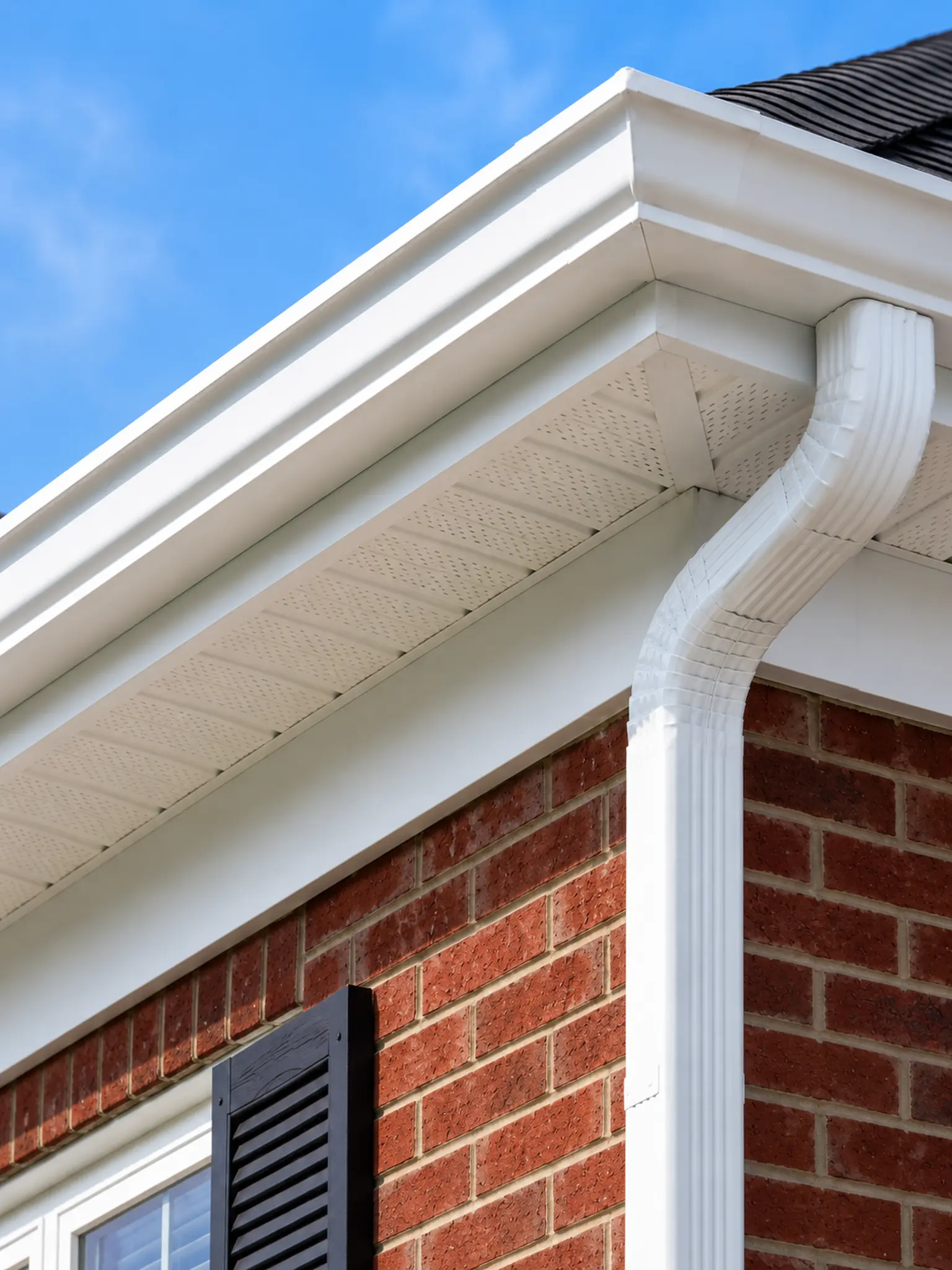 Clean, gleaming gutters and fascia.